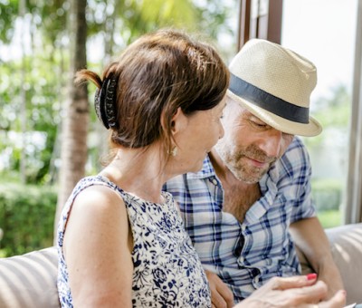 Couple waiting in a hotel lobby